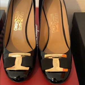 Black patent. Made in Italy.